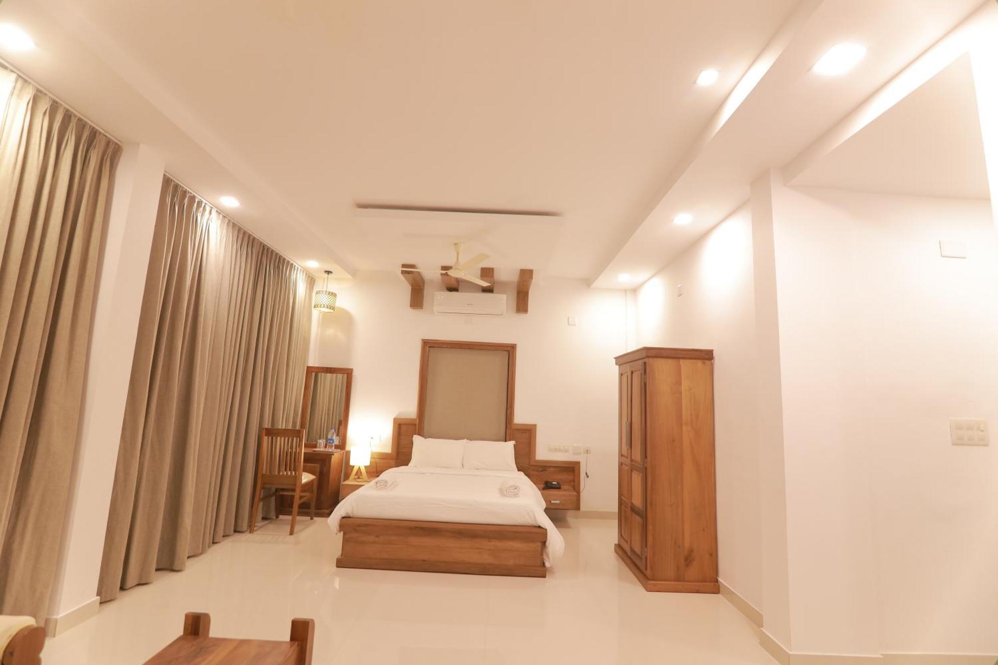 Opm Inn Payyannur Bagian luar foto